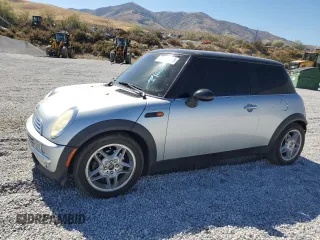 2002 MINI Hardtop with VIN WMWRC33472TC34281, listed as a Copart auction lot 71631644 with 196,947 mi miles and Salvage Title. Bid and sale history available at DreamBid. Image 1.
