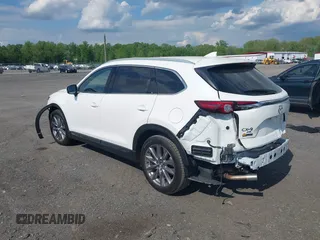 2021 Mazda CX-9 Grand Touring z VIN JM3TCBDY2M0541290, wystawiony jako IAAI lot #42216643 z przebiegiem 38 661 mil mil oraz . Historia ofert i sprzedaży dostępna na DreamBid. Obrazek 3.