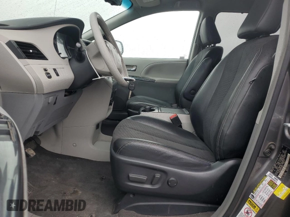 2014 Toyota Sienna SE with VIN 5TDXK3DC3ES470042, listed as a Copart auction lot 49254335 with 99,208 mi miles and Salvage Title. Bid and sale history available at DreamBid. Image 7.