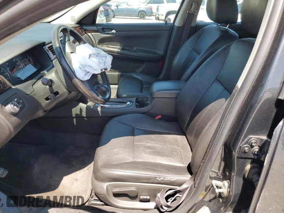 2014 Chevrolet Impala LTZ with VIN 2G1WC5E32E1182483, listed as a Copart auction lot 60308935 with 116,714 mi miles and Salvage title. Bid and sale history available at DreamBid. Image 7.