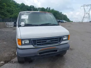 2006 Ford Econoline Cargo with VIN 1FTNE24W06DA77101, listed as a IAAI auction lot 42740817 with 196,854 mi miles and . Bid and sale history available at DreamBid. Image 6.
