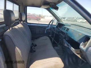 1987 Nissan Hardbody E z VIN JN6ND11S1HW030629, wystawiony jako Copart lot #65657004 z przebiegiem 181 228 mil mil oraz Szkody całkowita. Historia ofert i sprzedaży dostępna na DreamBid. Obrazek 10.