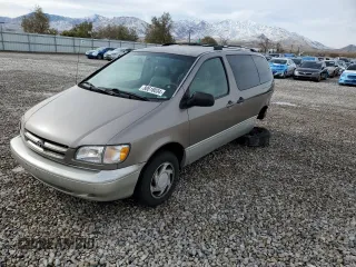 1999 Toyota Sienna LE with VIN 4T3ZF13C7XU133135, listed as a Copart auction lot 80618034 with 200,910 mi miles and Salvage Title. Bid and sale history available at carsss.com. Image 1.