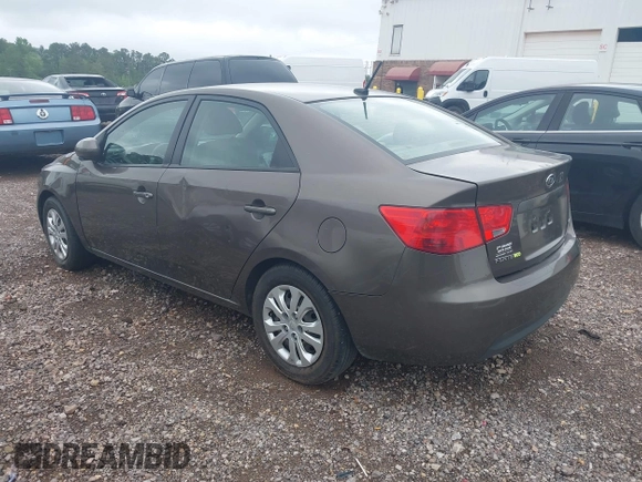 2013 Kia Forte EX with VIN KNAFU4A25D5719014, listed as a IAAI auction lot 42079529 with 222,801 mi miles. Bid and sale history available at carsss.com. Image 3.