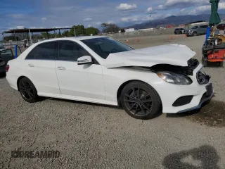 2016 Mercedes-Benz E 350 Sport with VIN WDDHF5KB3GB256120, listed as a Copart auction lot 53558525 with 128,522 mi miles and Salvage Title. Bid and sale history available at DreamBid. Image 4.