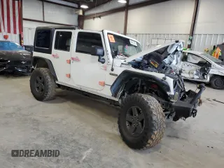 2016 Jeep Wrangler Unlimited Freedom with VIN 1C4BJWDG9GL199557, listed as a Copart auction lot 59421835 with 171,838 mi miles and Salvage title. Bid and sale history available at DreamBid. Image 4.