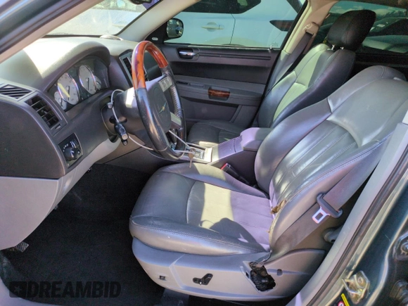 2005 Chrysler 300 with VIN 2C3AA63H35H659798, listed as a Copart auction lot 50322065 with 153,944 mi miles and Salvage Title. Bid and sale history available at carsss.com. Image 7.