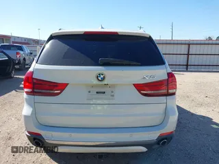 2014 BMW X5 sDrive35i with VIN 5UXKR2C53E0C01692, listed as a IAAI auction lot 41727216 with 135,985 mi miles. Bid and sale history available at carsss.com. Image 16.