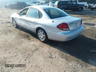 2005 Ford Taurus SE z VIN 1FAFP53U25A216523, wystawiony jako IAAI lot #42648554 z przebiegiem 175 042 mil mil oraz . Historia ofert i sprzedaży dostępna na DreamBid. Obrazek 3.