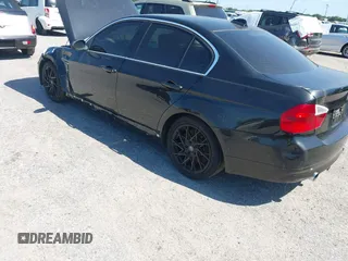 2008 BMW 3 Series 335xi with VIN WBAVD53578A284258, listed as a IAAI auction lot 42050367 with 184,998 mi miles. Bid and sale history available at carsss.com. Image 3.