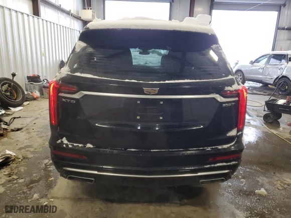 2021 Cadillac XT6 Luxury with VIN 1GYKPAR41MZ121325, listed as a Copart auction lot 87708455 with 93,270 mi miles and Salvage Title. Bid and sale history available at carsss.com. Image 6.