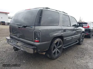 2001 Chevrolet Tahoe LS with VIN 1GNEK13T31R119807, listed as a IAAI auction lot 41342701 with 306,277 mi miles. Bid and sale history available at carsss.com. Image 4.