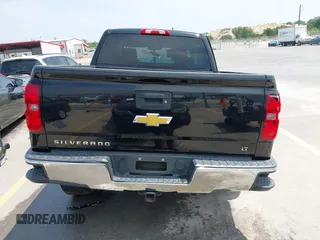 2014 Chevrolet Silverado 1500 LT with VIN 3GCPCREC7EG240999, listed as a IAAI auction lot 42075060 with 102,830 mi miles and . Bid and sale history available at DreamBid. Image 17.
