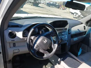 2012 Honda Pilot EX-L with VIN 5FNYF4H5XCB057255, listed as a IAAI auction lot 42001389 with 187,200 mi miles and . Bid and sale history available at DreamBid. Image 17.