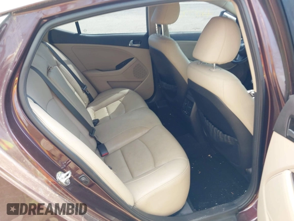 2014 Kia Optima EX z VIN 5XXGN4A77EG338455, wystawiony jako IAAI lot #42071765 z przebiegiem 136 331 mil mil oraz . Historia ofert i sprzedaży dostępna na DreamBid. Obrazek 8.