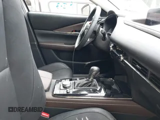 2024 Mazda CX-30 S Premium with VIN 3MVDMBDM1RM647840, listed as a IAAI auction lot 41724670 with 14,796 mi miles and . Bid and sale history available at DreamBid. Image 5.