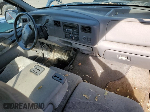 1999 Ford F-250 with VIN 1FTNF21S1XED16309, listed as a Copart auction lot 77267764 with 216,158 mi miles and Clean title. Bid and sale history available at DreamBid. Image 8.