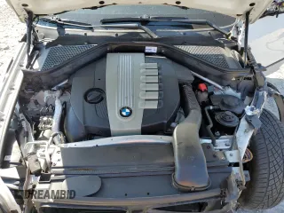 2011 BMW X5 35d с VIN 5UXZW0C58BL369718, выставлен на аукционе Copart как лот 54735695 с пробегом 199 303 миль миль и Списание • Salvage title. История ставок и продаж доступна на DreamBid. Изображение 12.