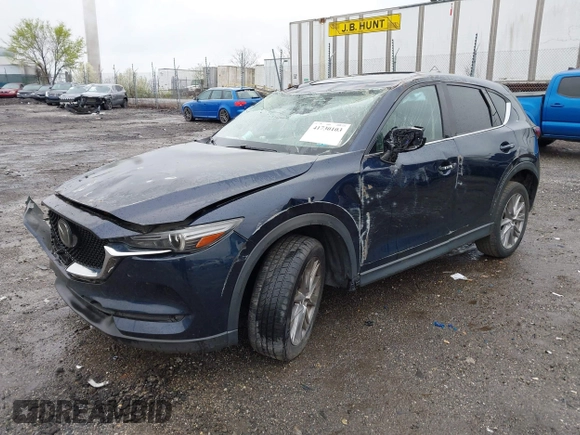 2019 Mazda CX-5 Grand Touring with VIN JM3KFBDM6K0592496, listed as a IAAI auction lot 41730103 with Not Provided miles and . Bid and sale history available at carsss.com. Image 2.
