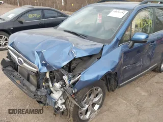 2016 Subaru Forester Touring с VIN JF2SJAXC4GH417596, выставлен на аукционе IAAI как лот 41832344 с пробегом 88 735 миль миль и . История ставок и продаж доступна на DreamBid. Изображение 6.