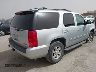 2014 GMC Yukon SLT with VIN 1GKS1CE02ER204452, listed as a IAAI auction lot 41804400 with 176,265 mi miles. Bid and sale history available at carsss.com. Image 4.