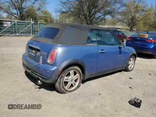 2006 MINI Convertible with VIN WMWRF33556TG14421, listed as a Copart auction lot 50090415 with 136,736 mi miles and Non repairable. Bid and sale history available at DreamBid. Image 3.
