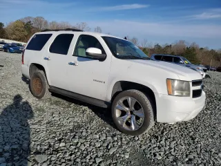 2008 Chevrolet Tahoe 1LT with VIN 1GNFC13J18R257002, listed as a Copart auction lot 50501195 with 216,091 mi miles and Salvage title. Bid and sale history available at DreamBid. Image 4.