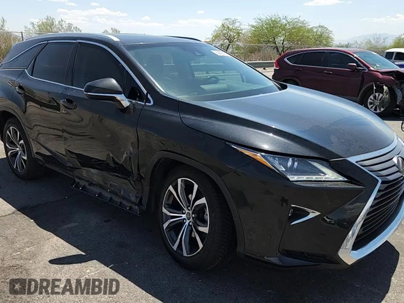 2019 Lexus RX 350L Premium with VIN JTJDZKCA4K2019484, listed as a Copart auction lot 60452455 with 66,007 mi miles and Salvage title. Bid and sale history available at DreamBid. Image 14.