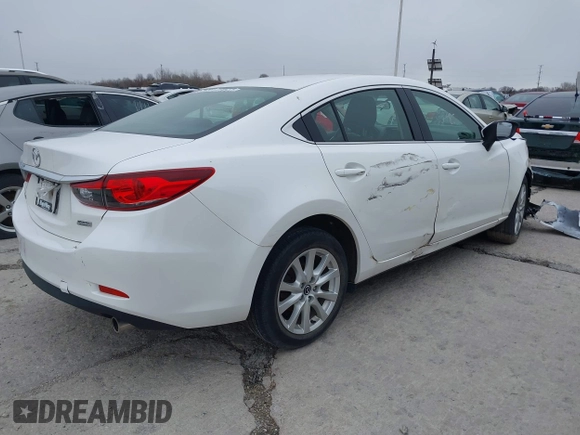 2015 Mazda Mazda6 i Sport with VIN JM1GJ1U68F1170884, listed as a IAAI auction lot 39229424 with 99,317 mi miles. Bid and sale history available at carsss.com. Image 4.