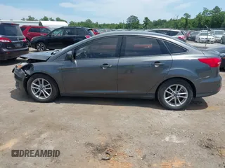 2018 Ford Focus SE with VIN 1FADP3FE2JL227679, listed as a IAAI auction lot 42296608 with 128,269 mi miles and . Bid and sale history available at DreamBid. Image 14.