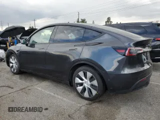 2024 Tesla Model Y with VIN 7SAYGDED1RF052031, listed as a Copart auction lot 48507865 with 5,365 mi miles and Salvage title. Bid and sale history available at DreamBid. Image 2.