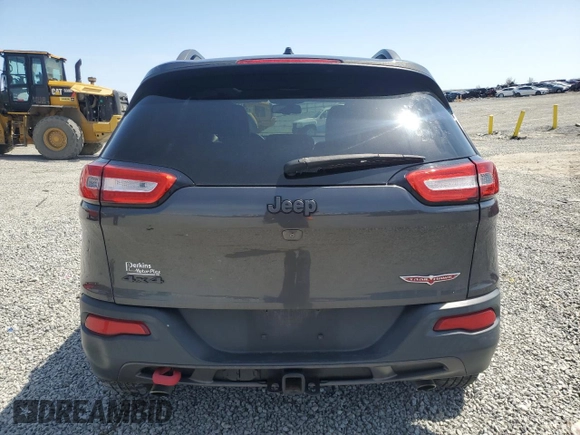 2015 Jeep Cherokee Trailhawk z VIN 1C4PJMBS2FW610618, wystawiony jako Copart lot #52243625 z przebiegiem 136 234 mil mil oraz Szkoda całkowita • Salvage title. Historia ofert i sprzedaży dostępna na DreamBid. Obrazek 6.