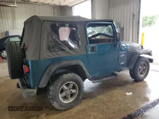 1997 Jeep Wrangler Sport with VIN 1J4FY19SXVP537075, listed as a Copart auction lot 61389915 with Not provided miles and Salvage title. Bid and sale history available at DreamBid. Image 3.