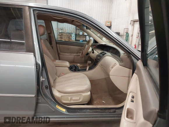 2001 Toyota Avalon XL with VIN 4T1BF28B01U162970, listed as a IAAI auction lot 41824530 with 255,051 mi miles and . Bid and sale history available at DreamBid. Image 5.