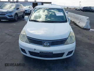 2007 Nissan Versa 1.8 S with VIN 3N1BC11E47L439072, listed as a IAAI auction lot 42083801 with 215,096 mi miles. Bid and sale history available at carsss.com. Image 6.