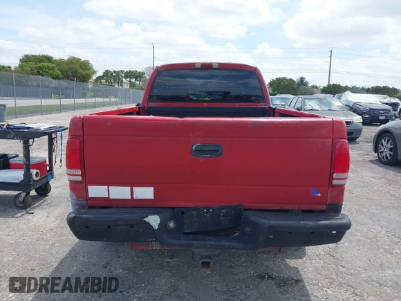 2002 Dodge Dakota Sport with VIN 1B7GL32X82S632091, listed as a IAAI auction lot 42091290 with 206,721 mi miles and . Bid and sale history available at carsss.com. Image 6.