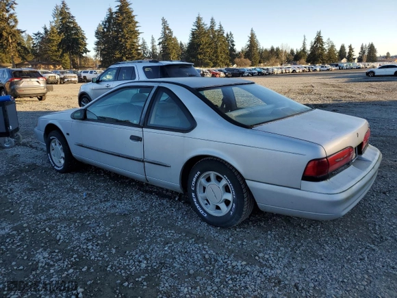 1995 Ford Thunderbird LX with VIN 1FALP62W5SH214974, listed as a Copart auction lot 42856995 with 150,454 mi miles and Clean Title. Bid and sale history available at carsss.com. Image 2.