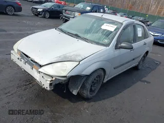 2001 Ford Focus LX with VIN 1FAFP33P31W297608, listed as a IAAI auction lot 41663965 with 142,898 mi miles and . Bid and sale history available at carsss.com. Image 2.