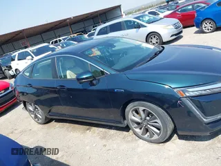 2018 Honda Clarity Touring z VIN JHMZC5F32JC001730, wystawiony jako IAAI lot #41718456 z przebiegiem 64 619 mil mil oraz . Historia ofert i sprzedaży dostępna na DreamBid. Obrazek 14.