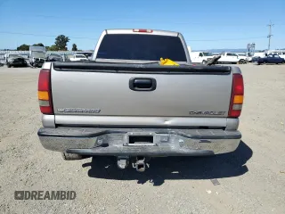 2002 Chevrolet Silverado 1500HD LT z VIN 1GCGK13U12F106955, wystawiony jako Copart lot #71199304 z przebiegiem Nie podano mil oraz Szkoda całkowita • Salvage title. Historia ofert i sprzedaży dostępna na DreamBid. Obrazek 6.