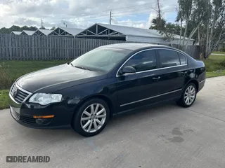 2010 Volkswagen Passat Sedan Komfort with VIN WVWJK7AN5AE140745, listed as a Copart auction lot 77474744 with 174,409 mi miles and Clean Title. Bid and sale history available at carsss.com. Image 2.
