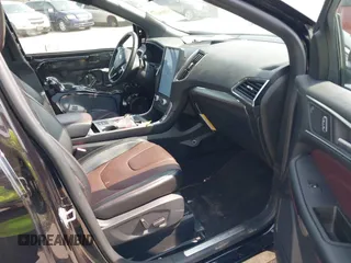 2022 Ford Edge Titanium with VIN 2FMPK4K99NBA12452, listed as a IAAI auction lot 42405627 with 53,015 mi miles and . Bid and sale history available at DreamBid. Image 5.