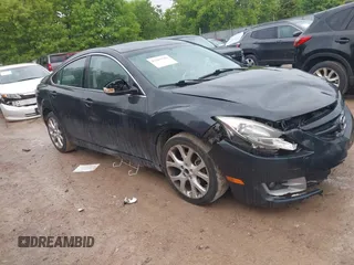 2013 Mazda 6 i Touring Plus z VIN 1YVHZ8EHXD5M12743, wystawiony jako IAAI lot #42365284 z przebiegiem 131 900 mil mil oraz . Historia ofert i sprzedaży dostępna na DreamBid. Obrazek 1.