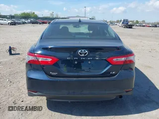 2019 Toyota Camry LE with VIN 4T1B11HK3KU254083, listed as a IAAI auction lot 42091530 with 26,635 mi miles and . Bid and sale history available at DreamBid. Image 16.