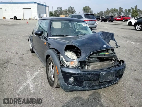 2007 MINI Hardtop z VIN WMWMF33537TT54433, wystawiony jako Copart lot #58813415 z przebiegiem 111 250 mil mil oraz Szkoda całkowita • Salvage title. Historia ofert i sprzedaży dostępna na DreamBid. Obrazek 13.