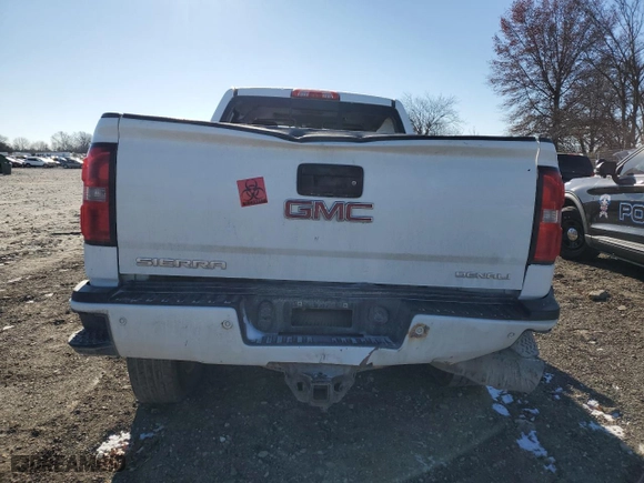 2015 GMC Sierra 2500HD Denali with VIN 1GT120E82FF597607, listed as a Copart auction lot 82844954 with 0 mi miles and Salvage Title. Bid and sale history available at carsss.com. Image 6.