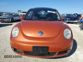 2010 Volkswagen Beetle with VIN 3VWRW3AG8AM035450, listed as a Copart auction lot 77938214 with 48,862 mi miles and Salvage title. Bid and sale history available at DreamBid. Image 5.