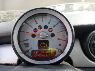 2010 MINI Hardtop with VIN WMWMF3C55ATZ64213, listed as a IAAI auction lot 42432622 with 124,913 mi miles and . Bid and sale history available at DreamBid. Image 7.