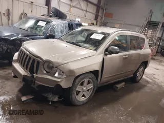 2010 Jeep Compass Sport with VIN 1J4NF4FB7AD501587, listed as a IAAI auction lot 41514419 with 154,826 mi miles. Bid and sale history available at carsss.com. Image 17.
