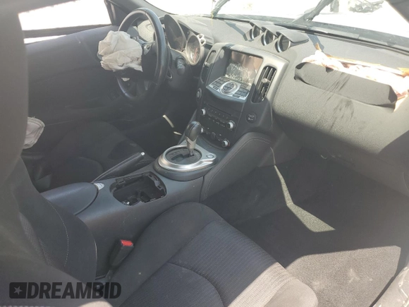 2016 Nissan 370Z Sport с VIN JN1AZ4EH9GM934860, выставлен на аукционе Copart как лот 54613555 с пробегом Не указан миль и Чистый • Clean title. История ставок и продаж доступна на DreamBid. Изображение 8.